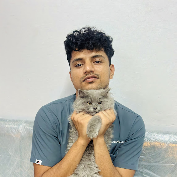 Dr. Abdul Ahad examining a cat at VetBridge Animal Hospital